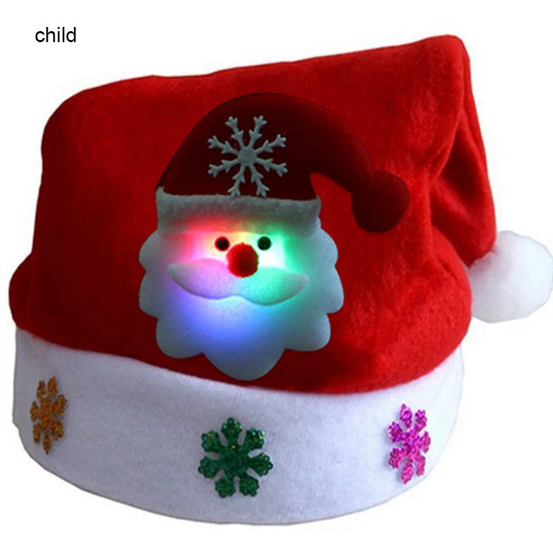 Kids Santa hat made with plush warm fabric and built-in LED lights. Childrens Navidad Christmas cap designed for comfort and festive winter celebrations.
